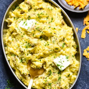 Aged Cheddar Mashed Potatoes - The only thing better than mashed potatoes? CHEESY mashed potatoes! | foxeslovelemons.com