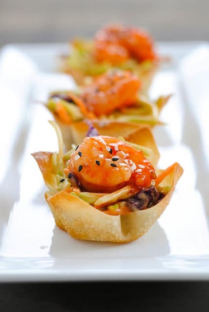 Asian Shrimp Wonton Cups - Crunchy wonton cups filled with broccoli slaw and topped with sweet chili glazed shrimp. Special yet incredibly simple! | foxeslovelemons.com