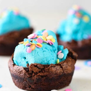 Celebrate one sweet birthday with these Brownie Bowls for Ice Cream. No special equipment needed - they're made in a cupcake pan! | foxeslovelemons.com