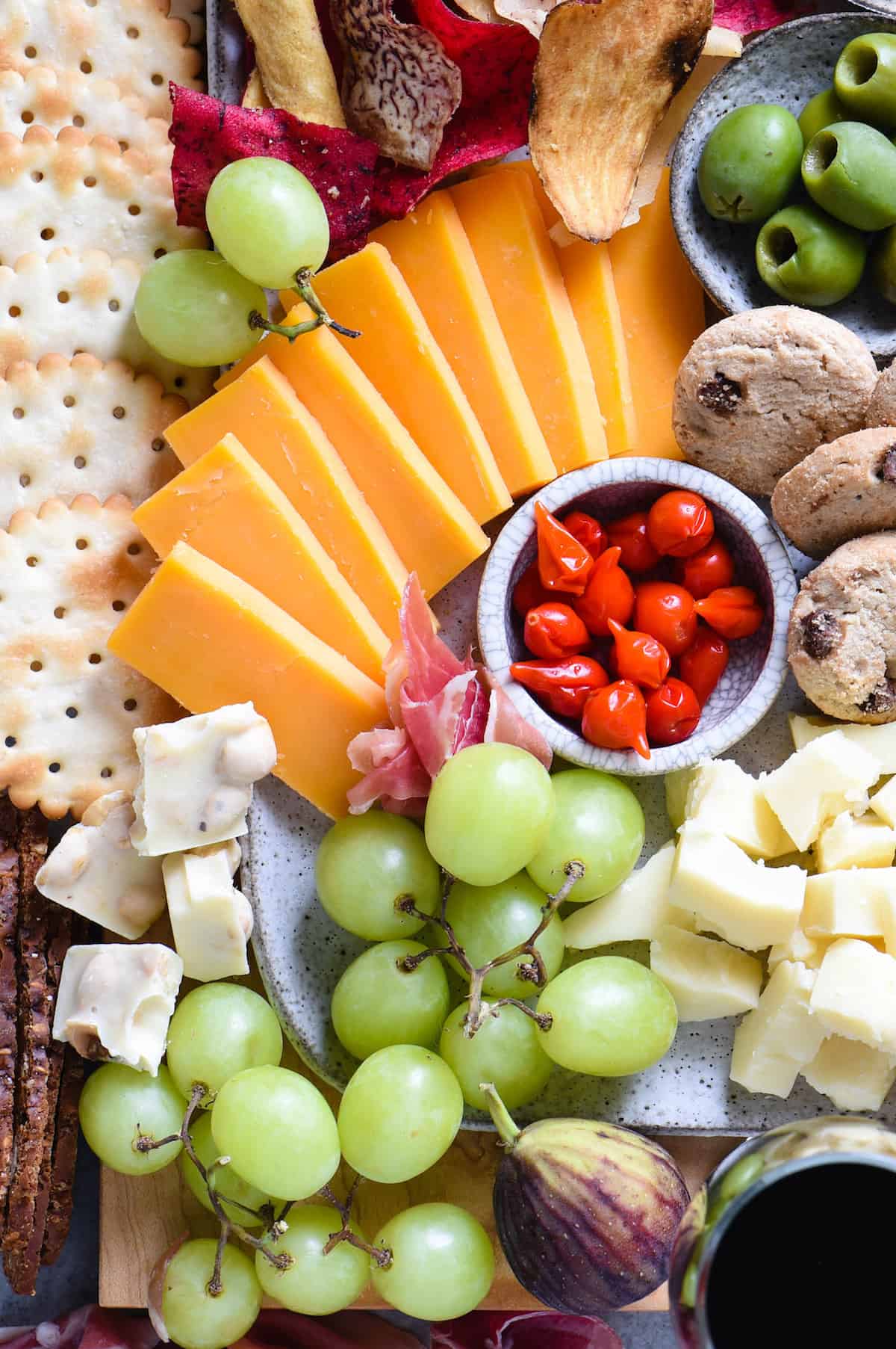 Making a cheese board for wine tasting? Follow this simple, down-to-earth guide to start pairing cheese, charcuterie and other snacks with wine! | foxeslovelemons.com