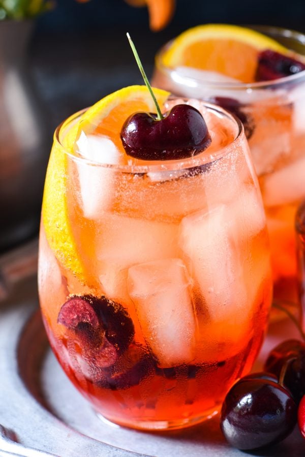 Cherry & Ginger Prosecco Spritz - Stir together this light and refreshing summer cocktail in just 5 minutes! Perfect for a party, or just one! | foxeslovelemons.com