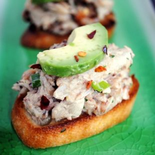 Crabby Snacks - Crunchy crostini topped with cold crab salad and creamy avocado. Inspired by "Silver Linings Playbook." | foxeslovelemons.com