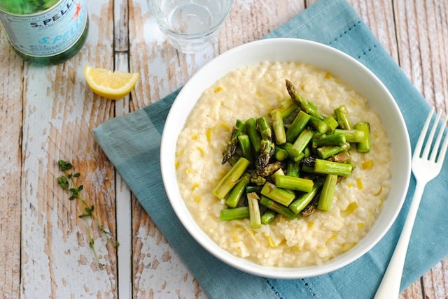 Goat Cheese Risotto with Asparagus - A restaurant-quality dish YOU can make at home. Creamy leek and goat cheese risotto topped with sautéed asparagus. | foxeslovelemons.com