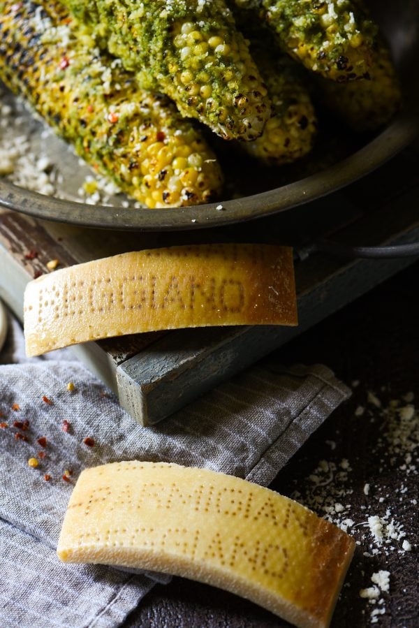 Grilled Parmesan-Pesto Sweet Corn - 4 ingredients. 8 minutes cook time. The best summer side dish ever! | foxeslovelemons.com