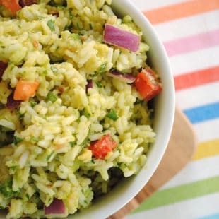 Guacamole Rice - all of the ingredients from guacamole, smashed into rice for a unique side dish! Serve warm or cold. | foxeslovelemons.com