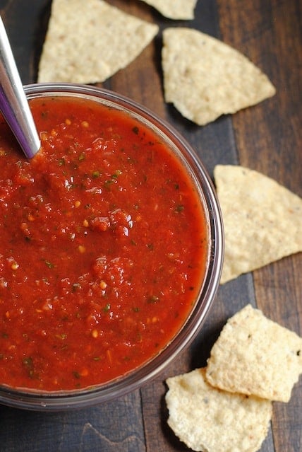 Overhead photo of bow of salsa with tortilla chips on the side.