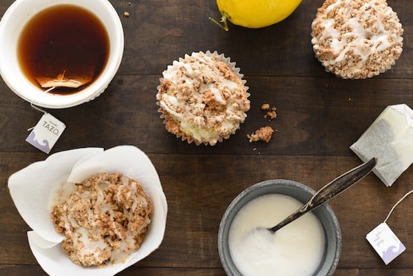 Lemon Earl Gray Streusel Muffins - Coffee cake-inspired muffins, infused with the flavors of tea and lemon zest. Topped with a simple brown sugar streusel and lemony glaze, they are perfect for breakfast or dessert! | foxeslovelemons.com