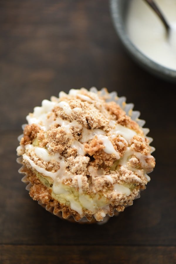 Lemon Earl Gray Streusel Muffins - Coffee cake-inspired muffins, infused with the flavors of tea and lemon zest. Topped with a simple brown sugar streusel and lemony glaze, they are perfect for breakfast or dessert! | foxeslovelemons.com