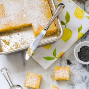 Meyer Lemon Bars with Poppyseed Crust - A flaky poppyseed crust topped with tart and sweet Meyer lemon filling. | foxeslovelemons.com