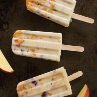 Peach Pie Ice Cream Bars - An irresistible combination of fresh peaches, crumbled pie crust and creamy frozen custard. | foxeslovelemons.com