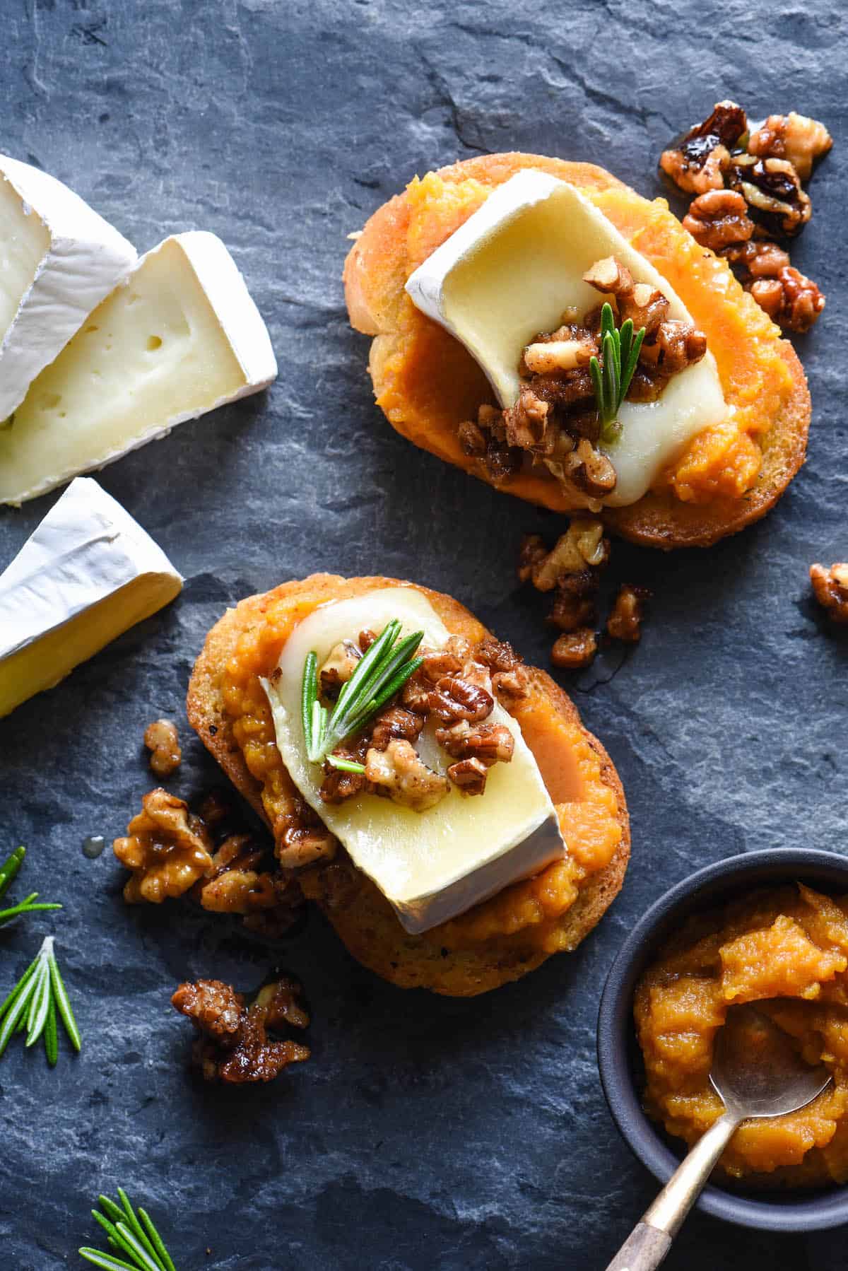 Impress your guests this holiday season with these Pumpkin & Brie Crostini with Candied Nuts. They look totally fancy, but they're 100% achievable for home cooks of all levels! | foxeslovelemons.com