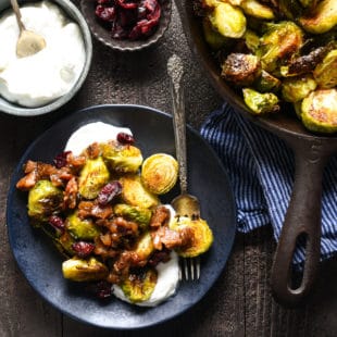 Roasted Brussels Sprouts with Greek Yogurt & Bacon Jam - A restaurant-quality side dish that you can easily serve at home. The whole family will eat their vegetables with this one! | foxeslovelemons.com