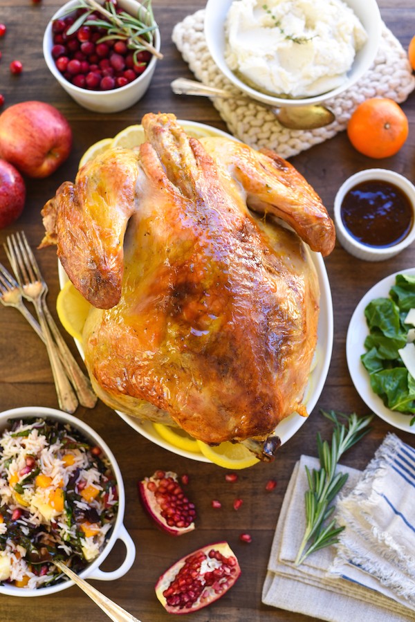 Roasted Turkey with Bourbon Apricot Glaze - Jazz up a classic roasted turkey with this simple glaze that gets brushed on when the bird comes out of the oven! | foxeslovelemons.com