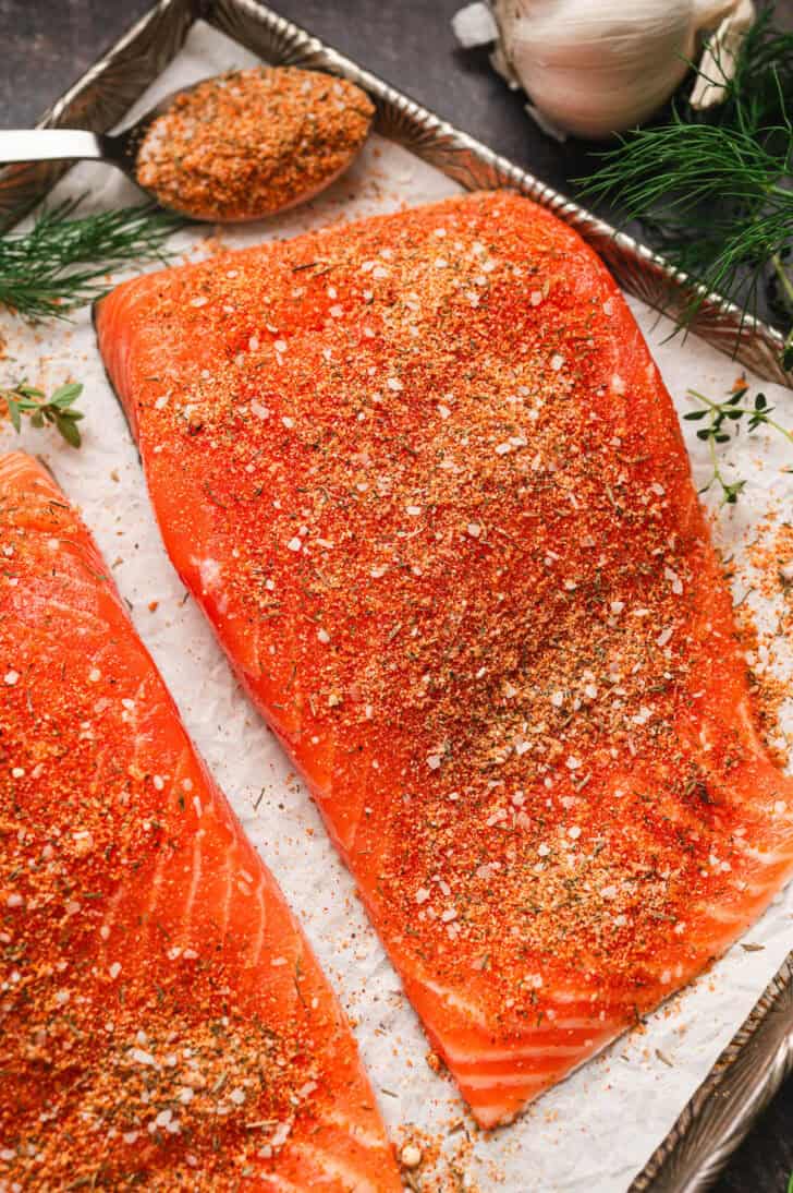 Pieces of raw fish crusted in salmon rub.