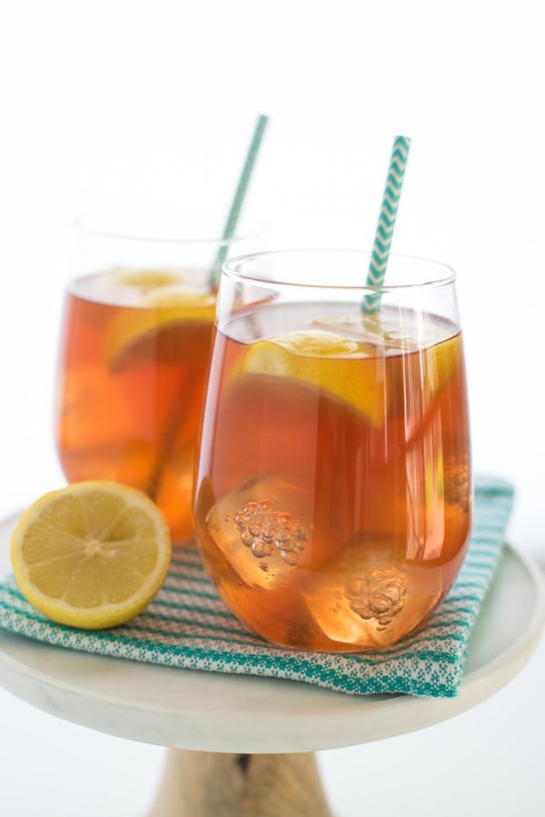 Spiked Pomegranate Arnold Palmer - A twist on the classic iced tea/lemonade drink, spiked with pomegranate liqueur. | foxeslovelemons.com