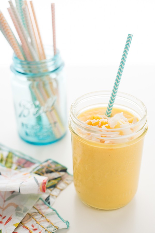 Tropical Sun Smoothie - Wake up your taste buds with this quick and healthful blender breakfast - a combination of pineapple, mango, banana, coconut and vanilla yogurt. | foxeslovelemons.com